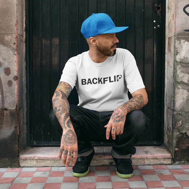 White T shirt with the word BACKFLIP printed across the chest