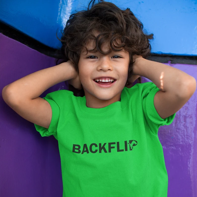 Green kids T shirt with the word BACKFLIP printed across the chest