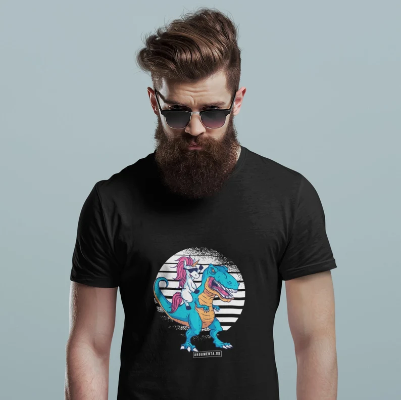 Black T shirt with a unicorn riding a T rex design